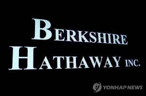 버크셔 해서웨이 이사 배우자, 최고가 부근 주식 매도